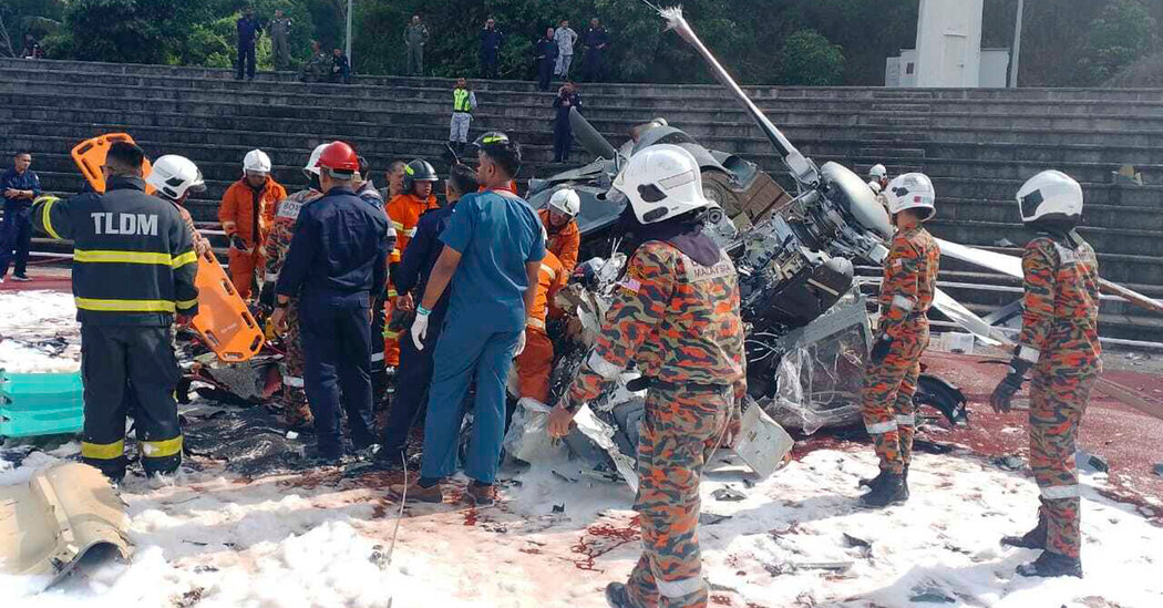 Malaysian Navy Helicopters Collide Midair, Killing 10