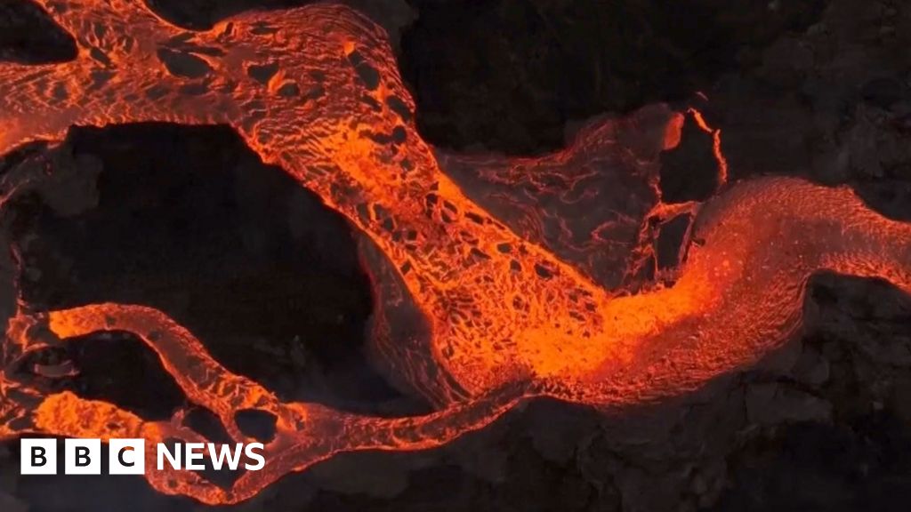 Mesmerising lava rivers as Icelandic volcano erupts